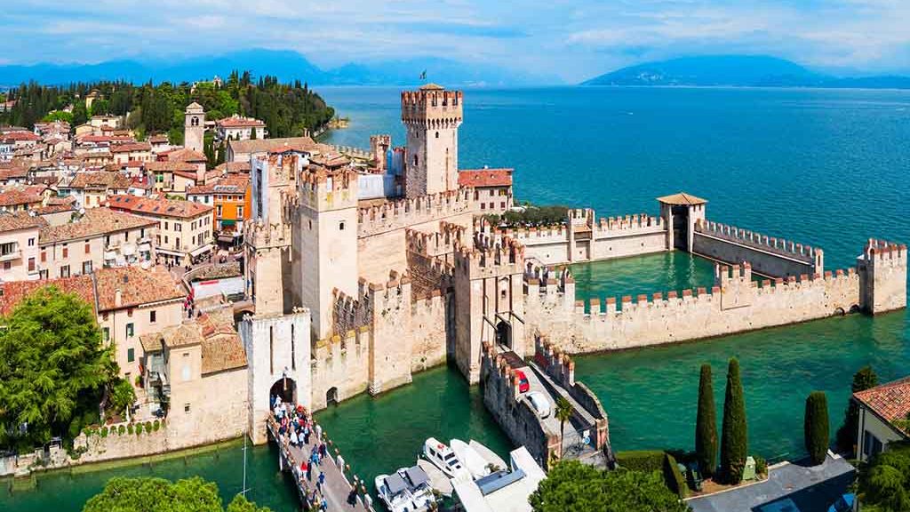 Scaligero Castle aerial panoramic view. Scaligero Castle is a fortress in the historical center of Sirmione town at the Garda Lake in Italy