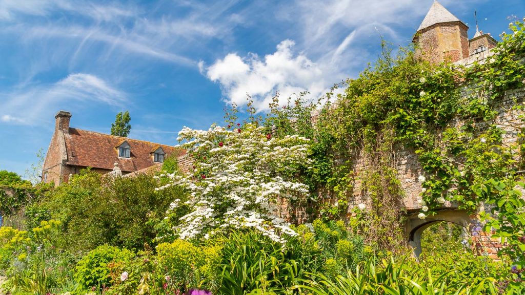 A mass of planting against the walls of the Sissinghurst Castle Gardens